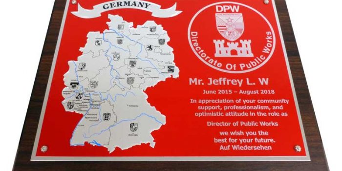 USAG Rheinland-Pfalz DPW 11215 W Plaque Trophy Center Trophy Shop Frame Shop Coins Embroidery Guidons Awards Plaques